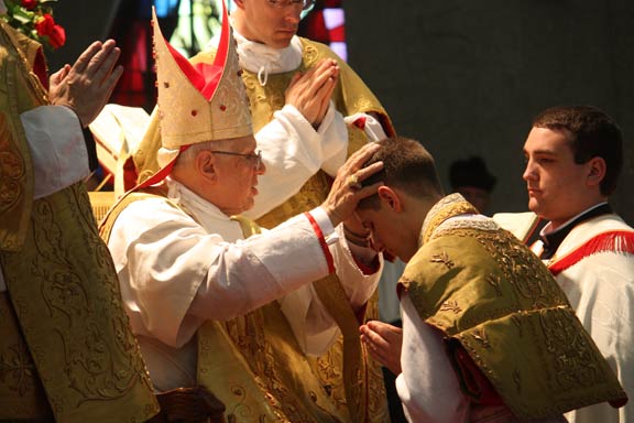 Bishop Bruskewitz Imposes Hands and Ordains Father Gregory Eichman