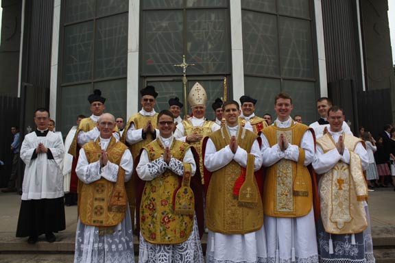 New Priests with the Bishop and Assistants