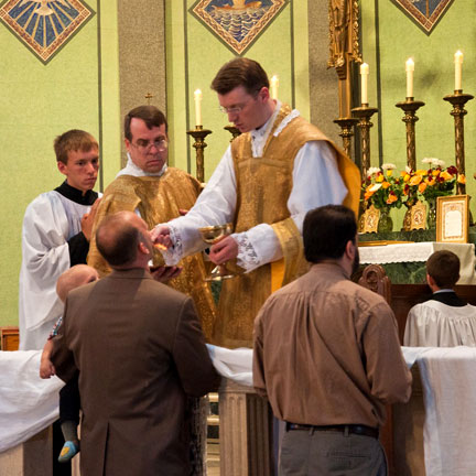 Fr. Kevin O'Neill's First Mass Administering Communion