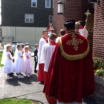 Pentecost Mass Begins with Father and First Communicants Processing