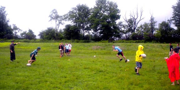 Campers apply their newly learned rugby skills.