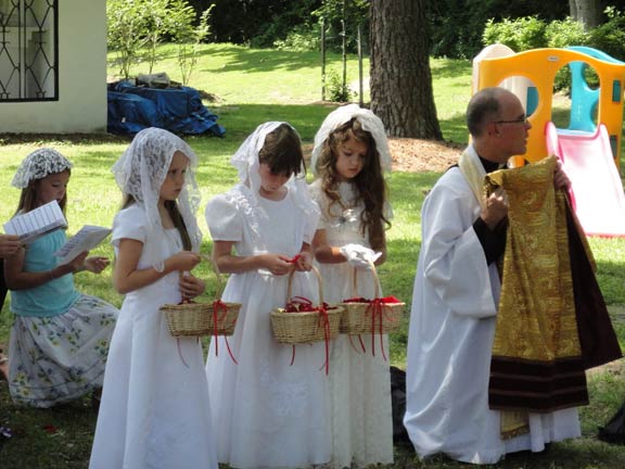 Flower Bearers for Our Lord, and Fr. Nichols FSSP, Bearing the Humeral Veil