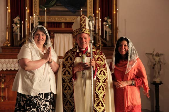 Archbishop Miller with Confirmand and Sponsor