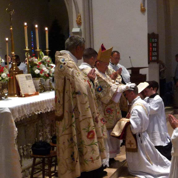 Bishop Serratelli Imposes Hands on Fr. Bartholomew
