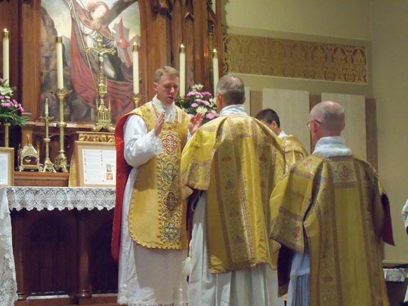 Fr. Bartholomew Prepares to Offer the Collect