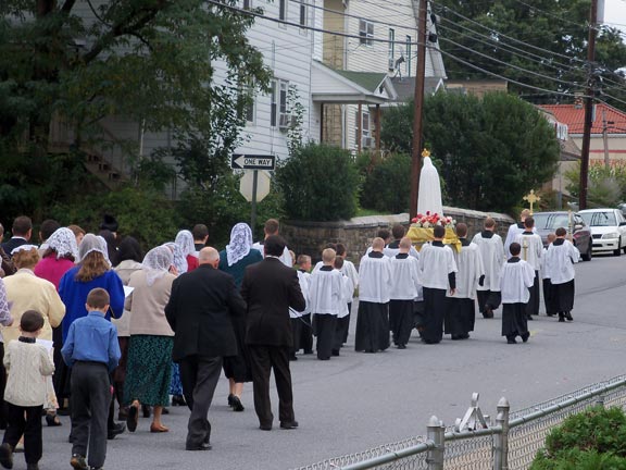 Fr. Joseph Poisson, FSSP, Leads the Rosary Procession
