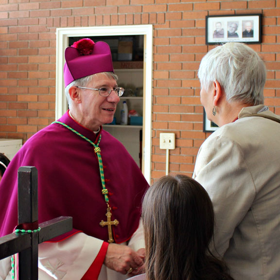 Bishop Conlon greets the faithful after Mass.