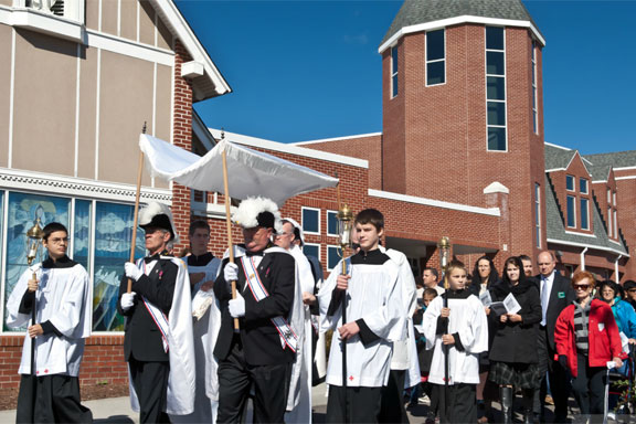 The procession begins at Star of the Sea Catholic Church.