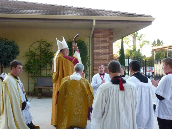 His Excellency Imparts His Blessing Upon Priests and Servers