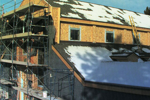 A January web cam image of the exterior being framed in for installation of the stone facade.